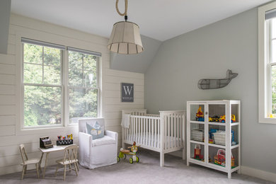 Inspiration for a large country gender-neutral carpeted and gray floor nursery remodel in Boston with gray walls