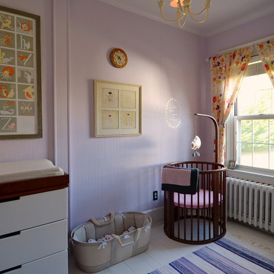 Nursery - scandinavian girl painted wood floor nursery idea in New York with pink walls