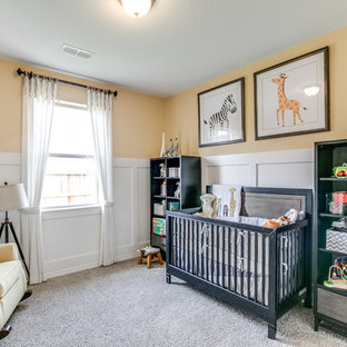 Elegant gender-neutral carpeted and gray floor nursery photo in Houston with yellow walls