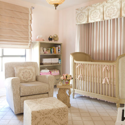 Large transitional girl carpeted nursery photo in Los Angeles with pink walls