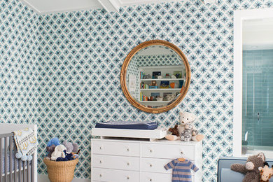 Example of a transitional boy nursery design in Los Angeles with multicolored walls