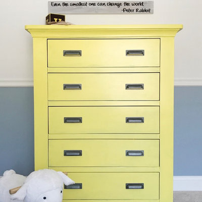 Inspiration for a large transitional gender-neutral carpeted nursery remodel in Other with gray walls