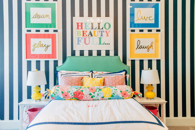 Nursery - mid-sized traditional girl carpeted nursery idea in Phoenix with multicolored walls