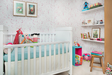 This is an example of a small modern nursery in Other.