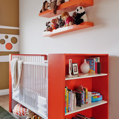 Inspiration for a mid-sized contemporary gender-neutral carpeted and beige floor nursery remodel in Orange County with white walls