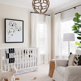Example of a mid-sized transitional boy carpeted, beige floor and wallpaper nursery design in Orlando with beige walls
