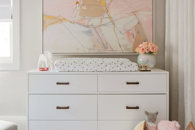 Inspiration for a mid-sized contemporary girl dark wood floor and gray floor nursery remodel in Chicago with gray walls
