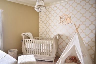 Example of a mid-sized transitional girl carpeted and beige floor nursery design in Houston with brown walls