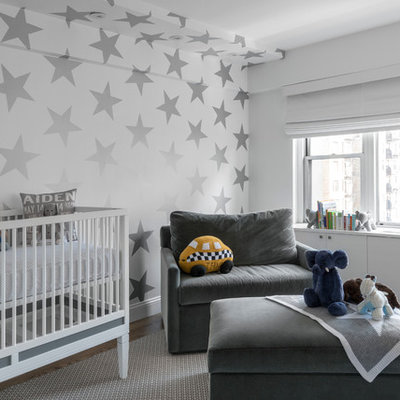 Nursery - mid-sized contemporary gender-neutral medium tone wood floor and gray floor nursery idea in New York with multicolored walls
