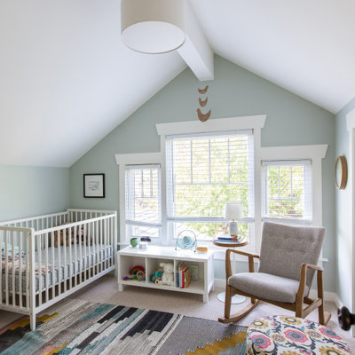 Inspiration for a mid-sized transitional gender-neutral carpeted and beige floor nursery remodel in Seattle with green walls