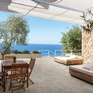 Immagine di un patio o portico contemporaneo