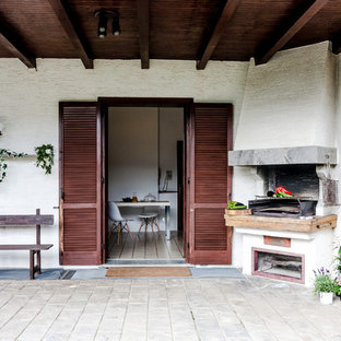 Immagine di un patio o portico country