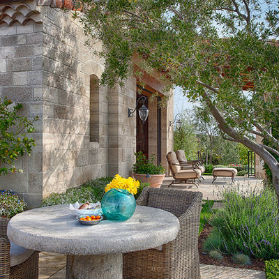 Tuscan patio photo in Orange County with no cover