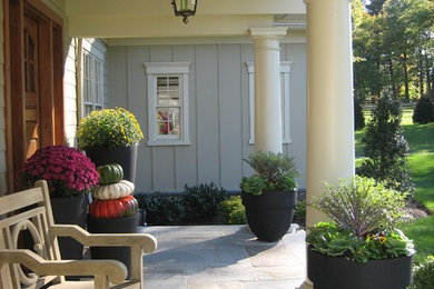 Elegant patio photo in Philadelphia with a roof extension