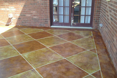 Medium sized back patio in Austin with concrete paving and a roof extension.