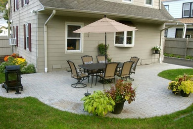 Patio - traditional backyard concrete paver patio idea in New York with no cover