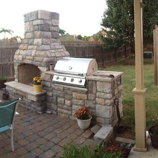 Example of a large classic patio design in Houston