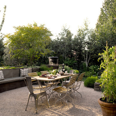 Trendy gravel patio photo in Seattle with no cover