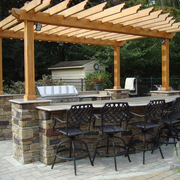 An outdoor kitchen with bar