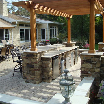 An outdoor kitchen with bar