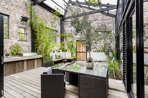 Industrial Patio by SQ Projects