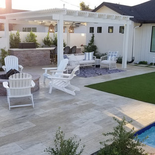 Patio kitchen - mid-sized country backyard tile patio kitchen idea in Phoenix with a pergola
