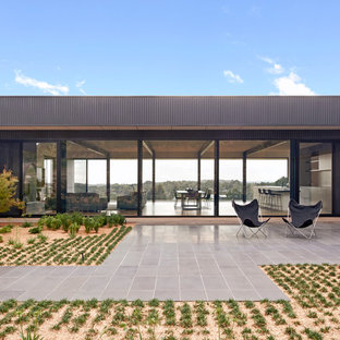 Design ideas for a contemporary patio in Other with tile and no cover.