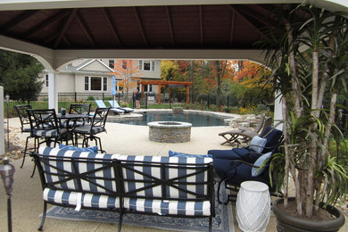 Patio - mid-sized traditional backyard concrete patio idea in Philadelphia with a gazebo