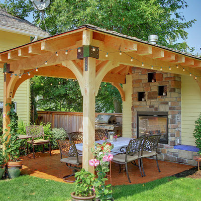 Trendy patio photo in Seattle with a gazebo and a fire pit