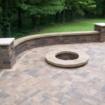 Backyard Brussels patio with Quarrystone walls and firepit