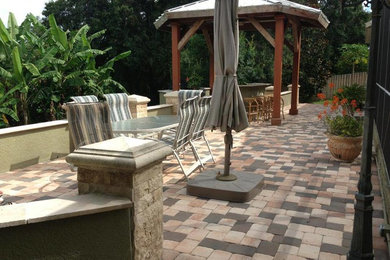 Island style patio photo in Tampa
