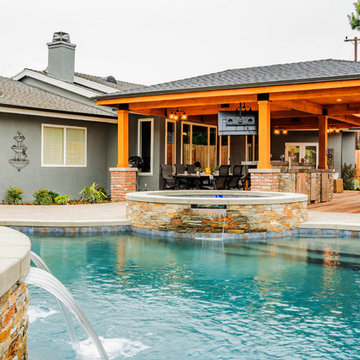 Swimming pool adjacent to patio cover