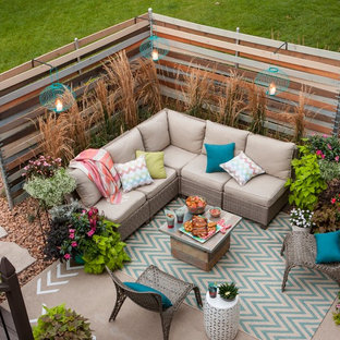 Inspiration for a mid-sized traditional backyard patio in Other.