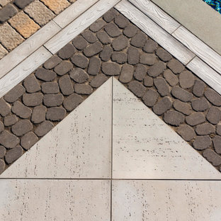 Inspiration for a timeless backyard concrete paver patio remodel in New York