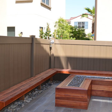 Backyard/ Wooden bench and fire pit