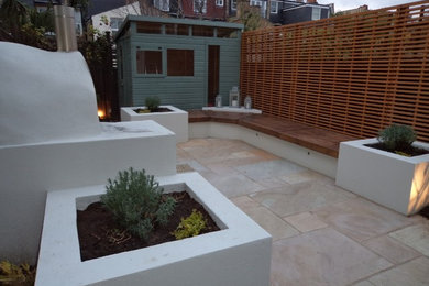 This is an example of a mediterranean patio in London.