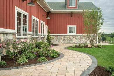 Example of a cottage patio design in Grand Rapids