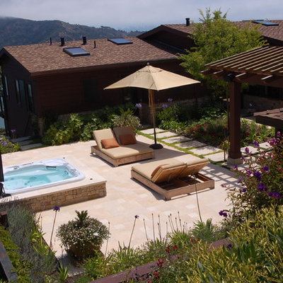 Inspiration for a mediterranean patio remodel in San Francisco with a pergola