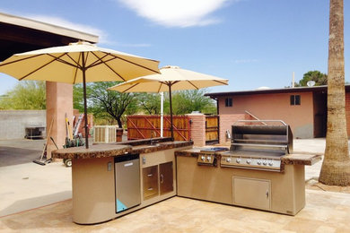 Inspiration for a large contemporary back patio in Phoenix with an outdoor kitchen, tiled flooring and no cover.