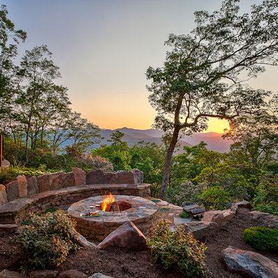 Example of a classic patio design in Other with a fire pit