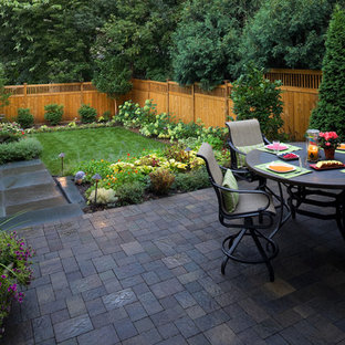Example of a trendy backyard patio design in Minneapolis