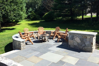 Patio - mid-sized transitional backyard tile patio idea in Boston with no cover
