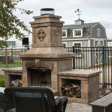 Belgard fireplace, outdoor bar and backyard patio with gazebo and deck
