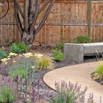 Bench and Gravel Path through Pollinator Garden