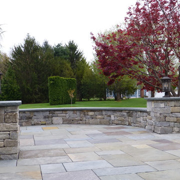 Bluestone Patio with Granite Cobblestone walls
