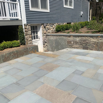 Bluestone walkway with carney stone steps, retaining walls with bluestone cap