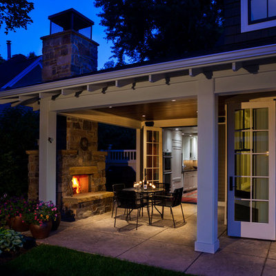 Patio - traditional patio idea in Other with a fire pit