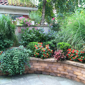 Brooklyn Garden with Retaining Walls, Outdoor Kitchen & Lush Plantings