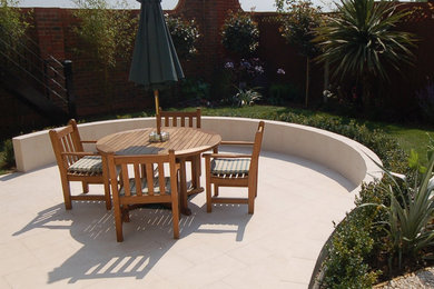This is an example of a contemporary patio in Essex.