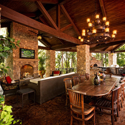 Patio - traditional patio idea in Other with a gazebo and a fire pit